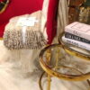 Stolik kawowy okrągły pomocniczy, metal w kolorze złota, szklny blat, wysoka jakość ArteHome
