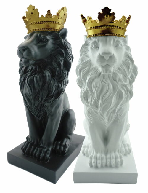 Dwie figurki ozdobne czarna i biała przedstawiające siedzącego lwa w złotej koronie
